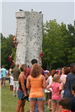 A Line Waiting to Utilize an Outdoor Rock Climbing Wall