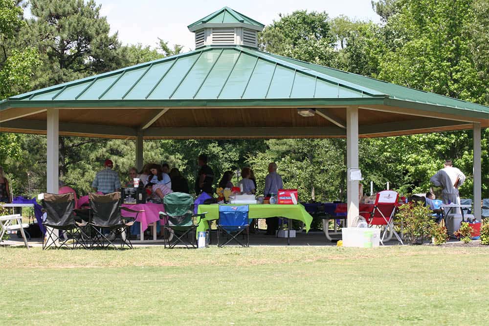 BBQ Happening at a Pavilion